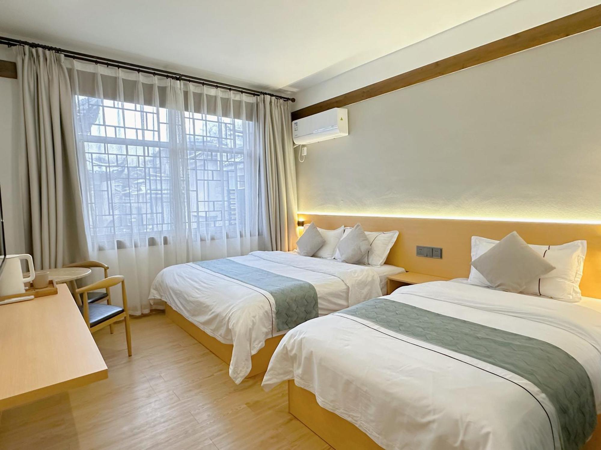 Hemu House Hotel เฟิ่งหวง ภายนอก รูปภาพ