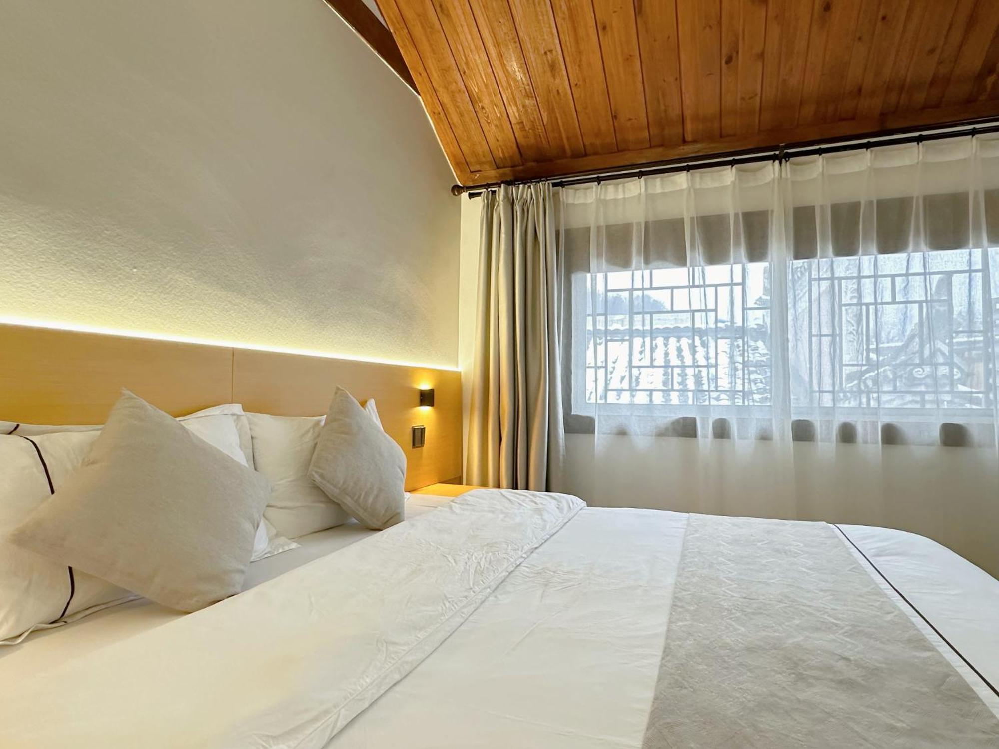 Hemu House Hotel เฟิ่งหวง ภายนอก รูปภาพ