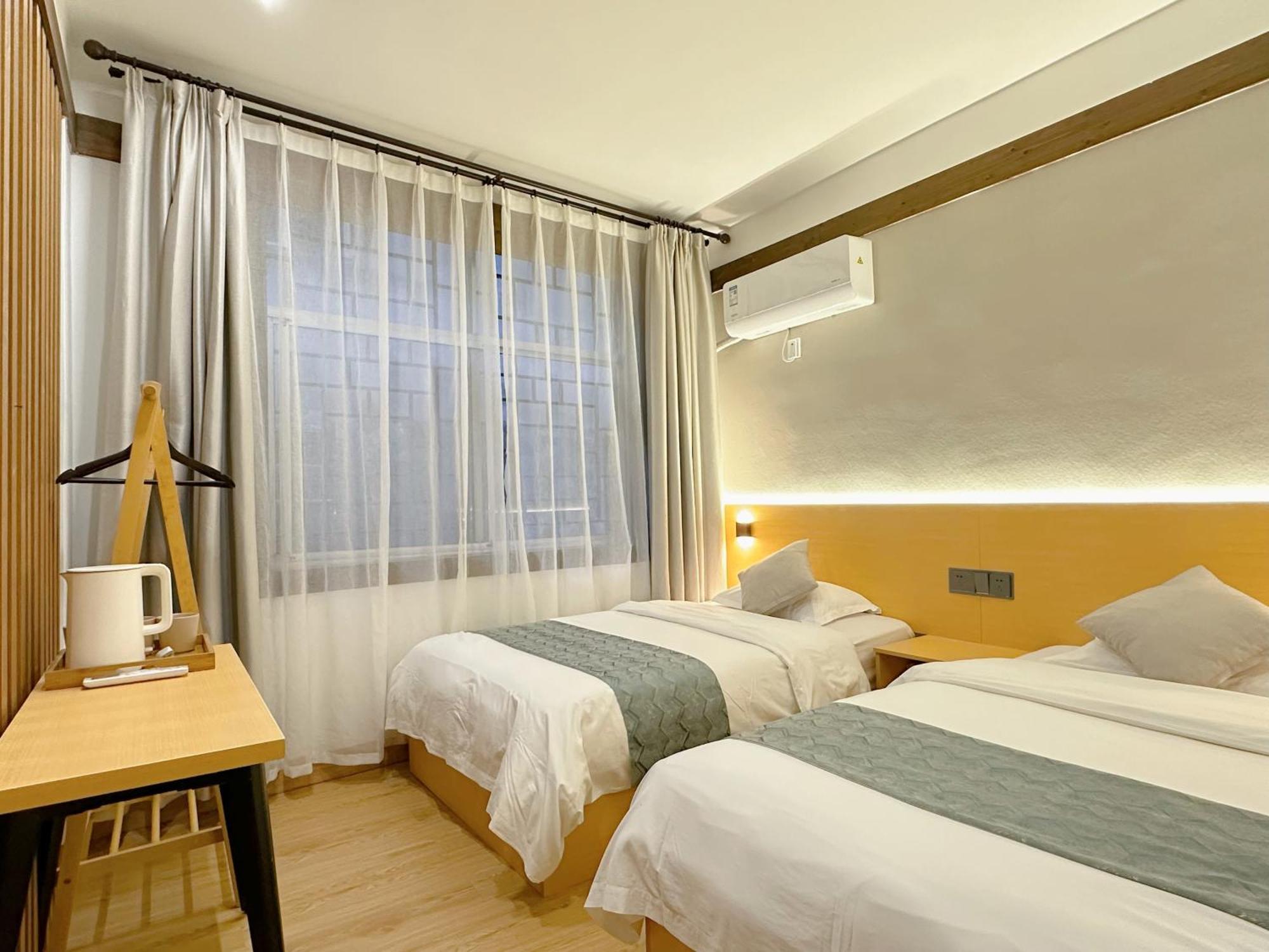 Hemu House Hotel เฟิ่งหวง ภายนอก รูปภาพ
