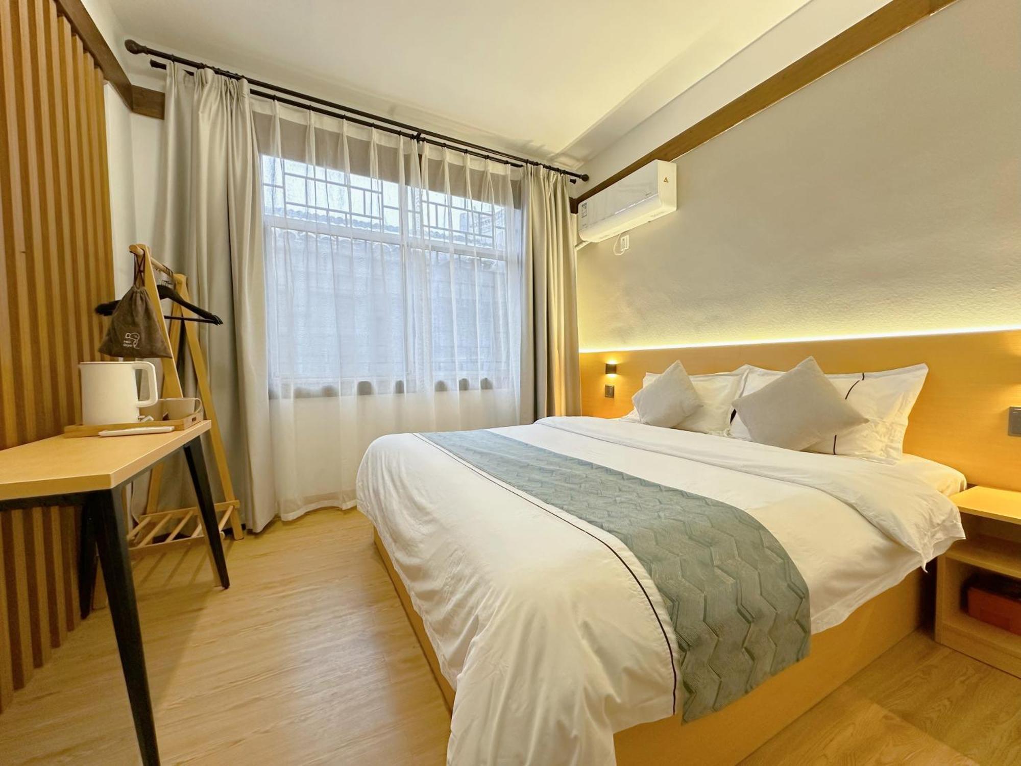 Hemu House Hotel เฟิ่งหวง ภายนอก รูปภาพ