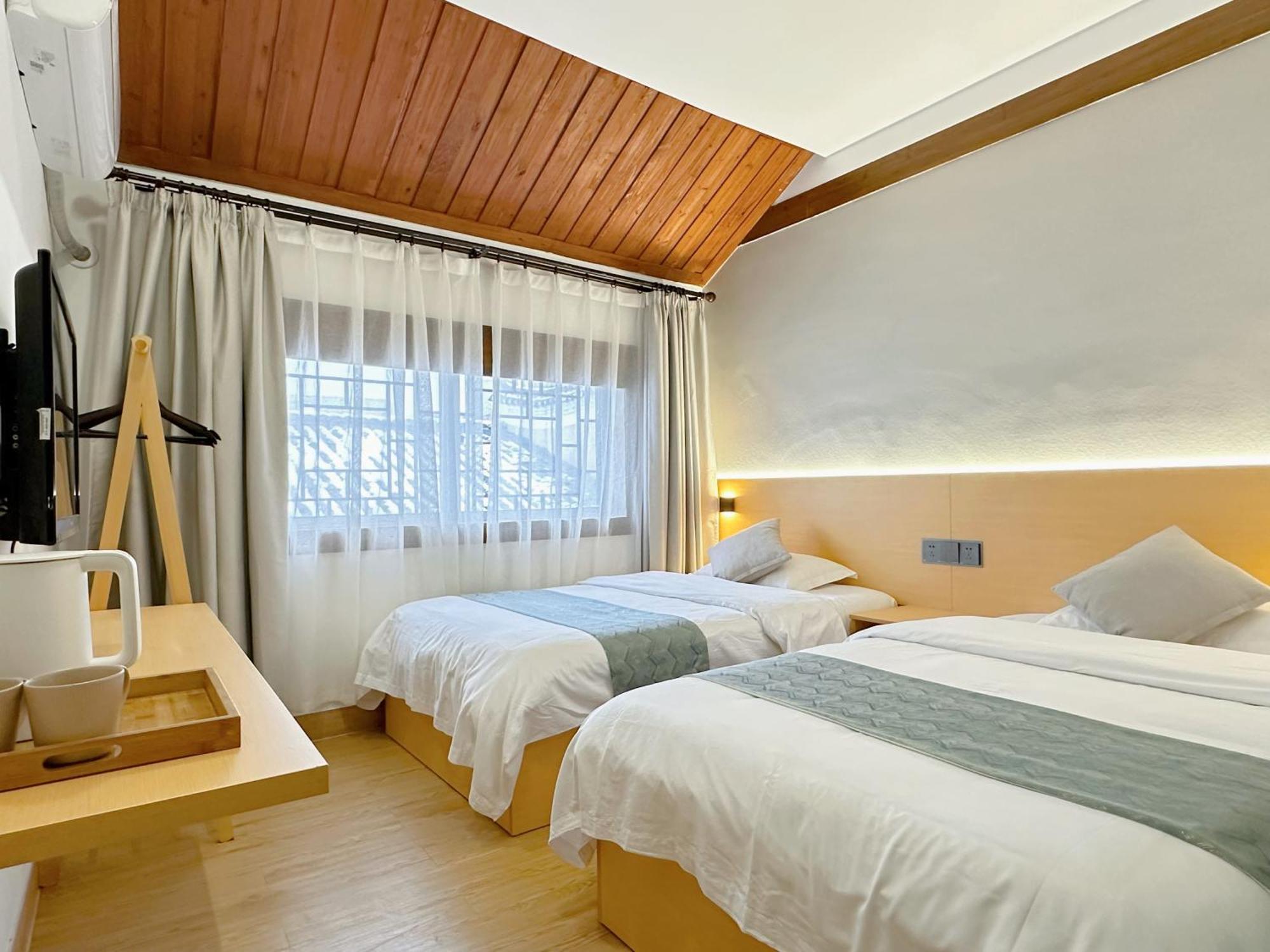 Hemu House Hotel เฟิ่งหวง ภายนอก รูปภาพ