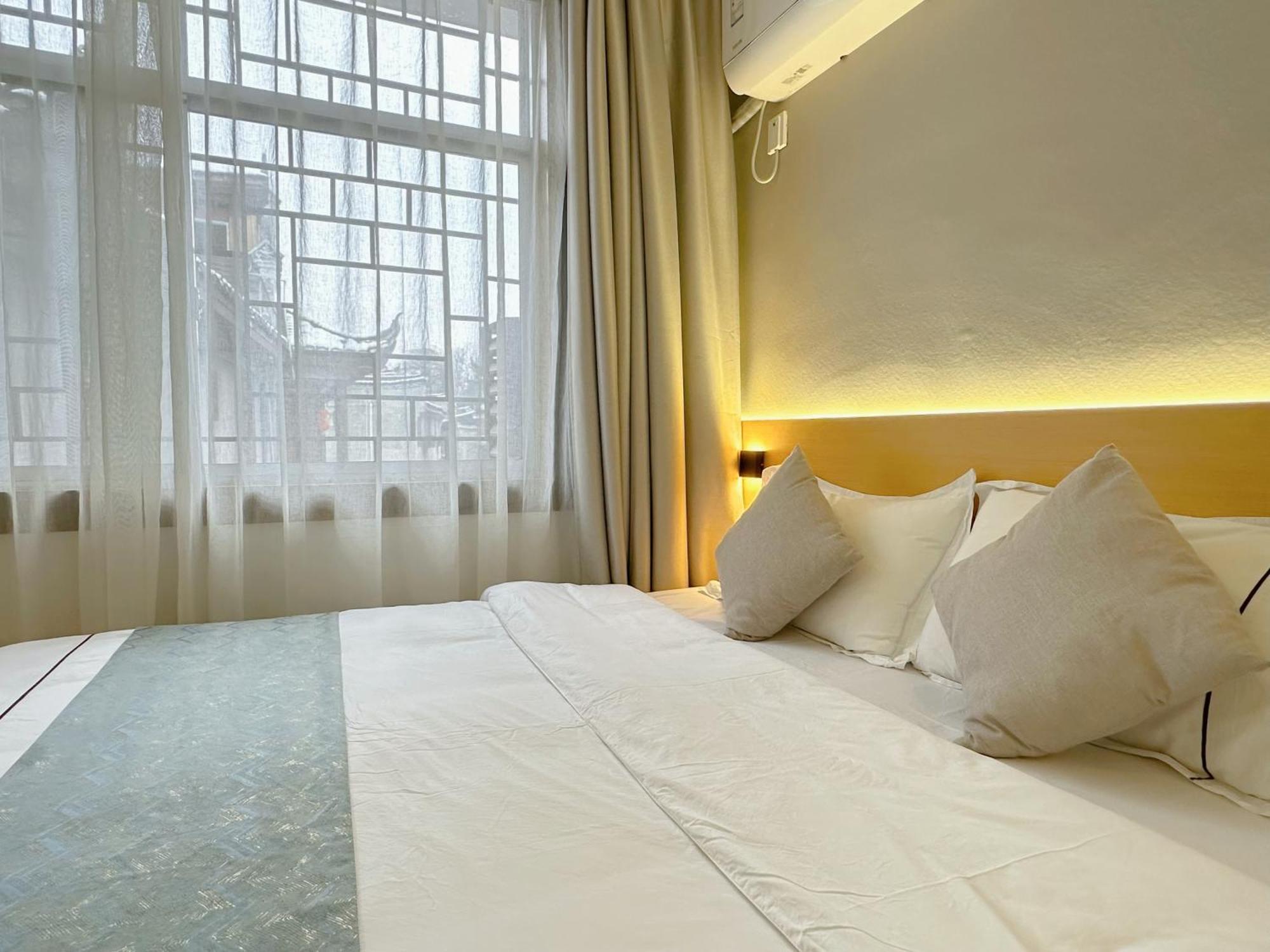 Hemu House Hotel เฟิ่งหวง ภายนอก รูปภาพ