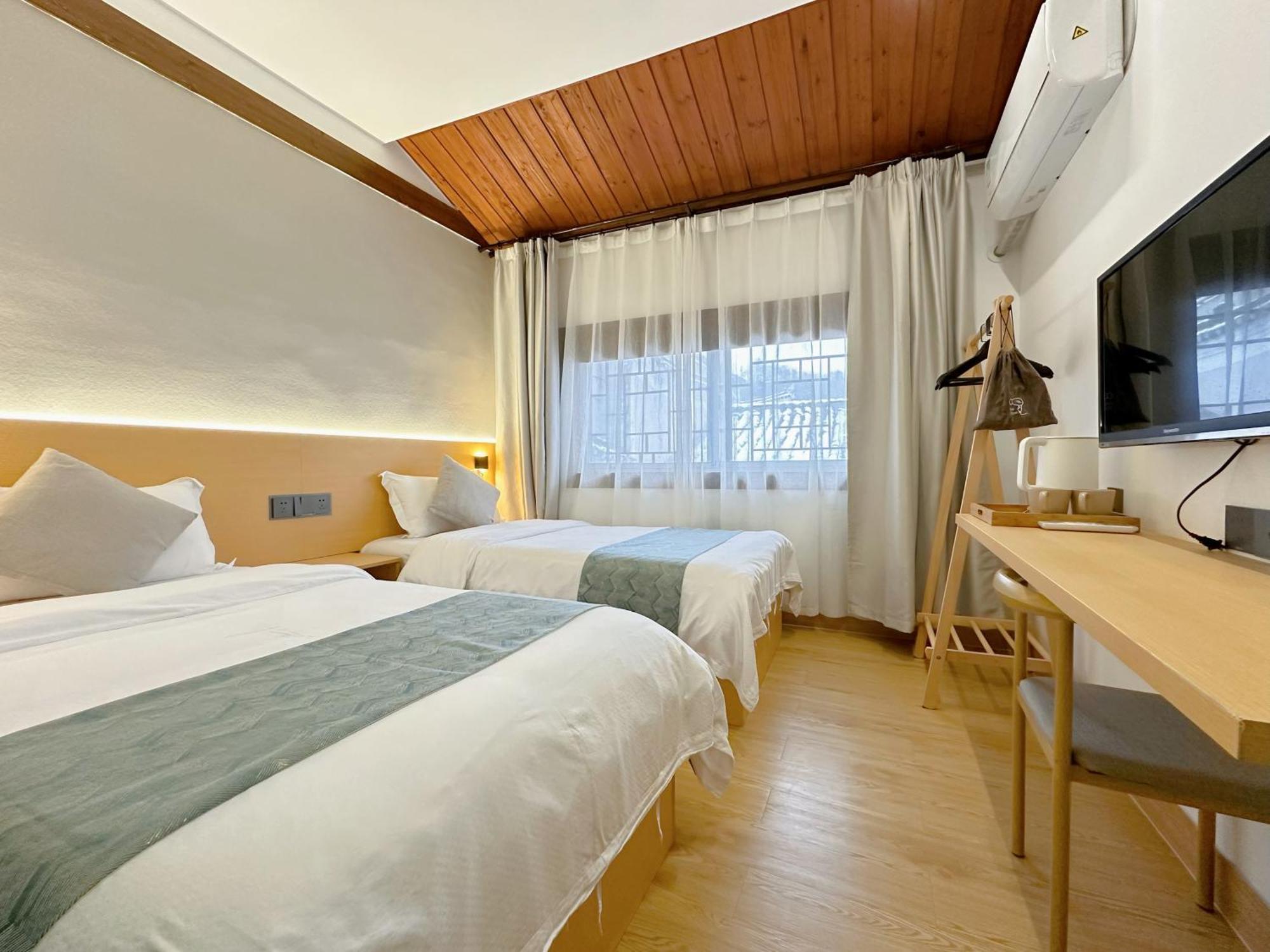 Hemu House Hotel เฟิ่งหวง ภายนอก รูปภาพ
